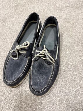 Sperry Black Leather Slip-On Boat Shoes with Cream Accents